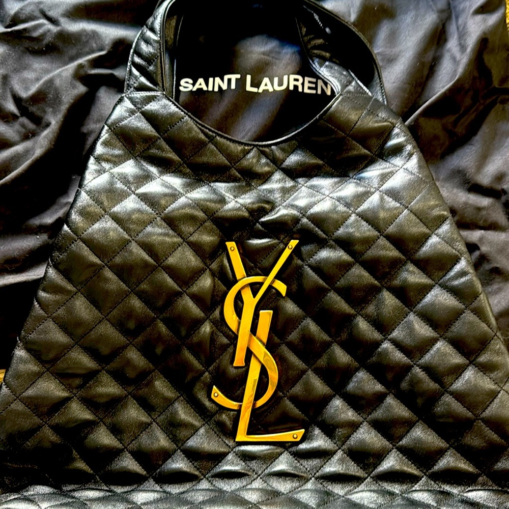Authentic YSL “It” bag in black leather with dust bag